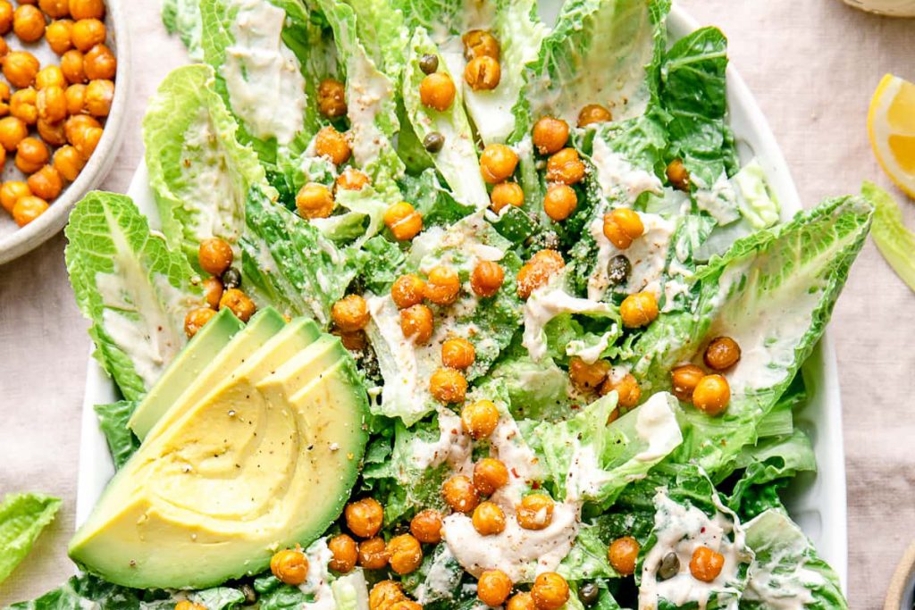 Caesar Salad with sliced avocado